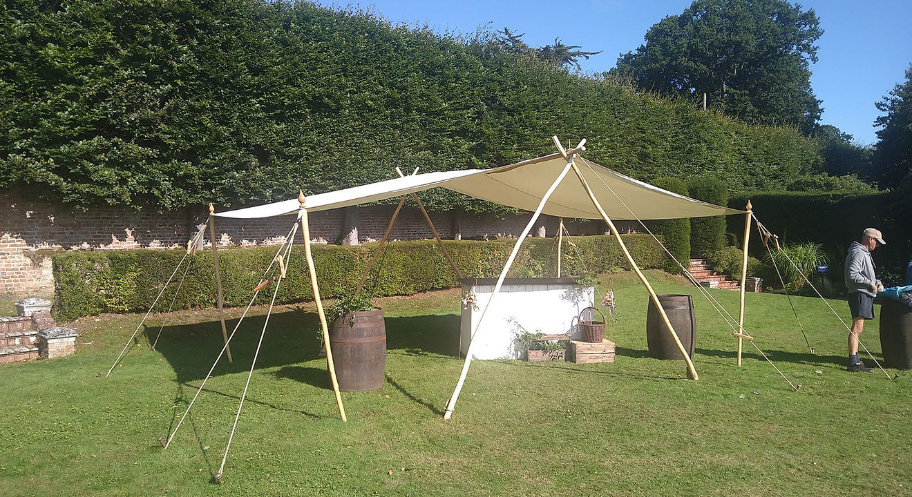 Canvas awning set up in a garden