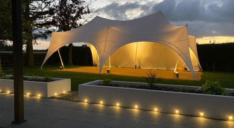 Illuminated Capri marquee at dusk