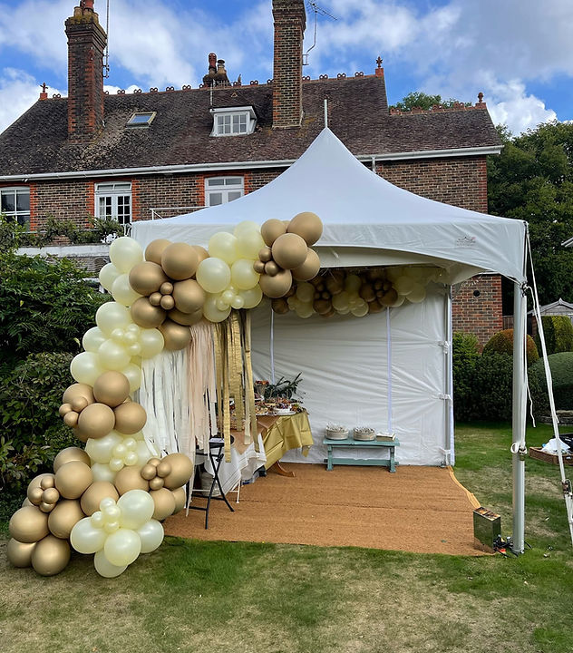 Pagoda marquee decorated with a balloon arch