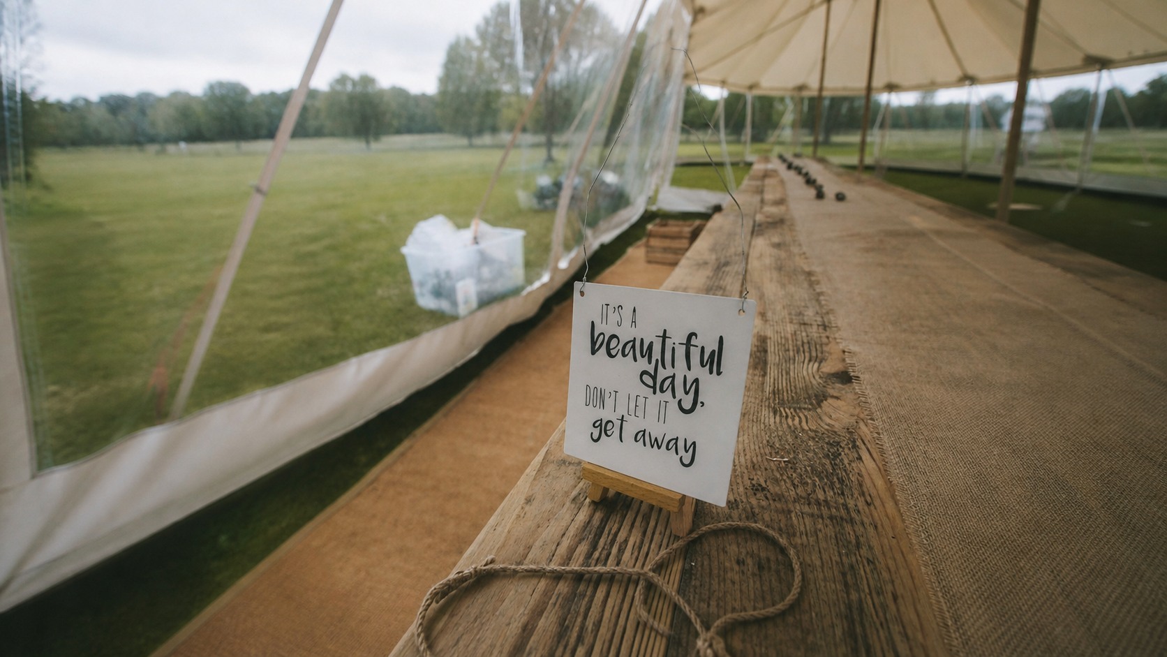 Wedding celebration beneath a marquee